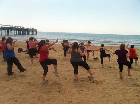 Outdoor Tai Chi session at a FitFarms weight loss camp